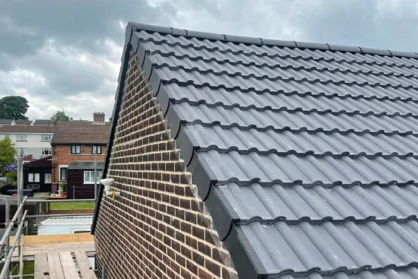 The edge of a newly installed roof